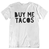 A mens white t-shirt with bold hand-drawn lettering that reads 'buy me tacos'