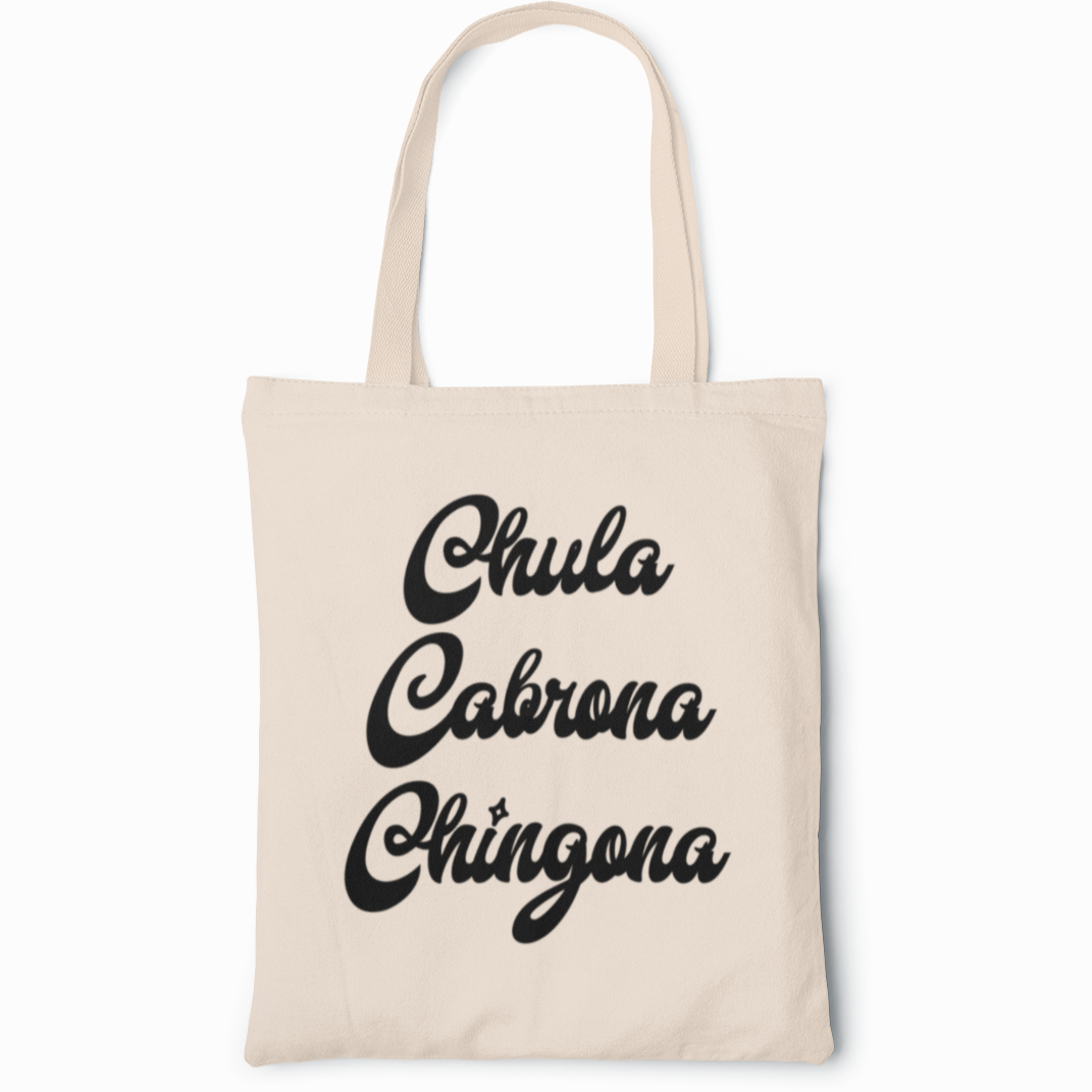 Canvas tote for Latinas, celebrating their strength and beauty with the words 'chula', 'chola', and 'chingona' displayed on the front in bold cursive