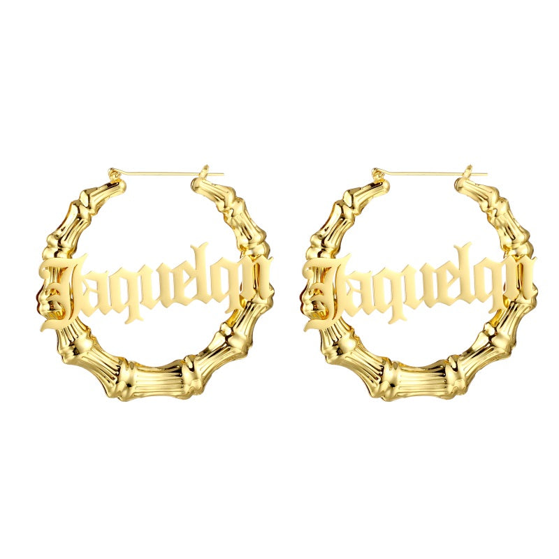 Gold Personalized bamboo hoop earrings with custom name in old English font