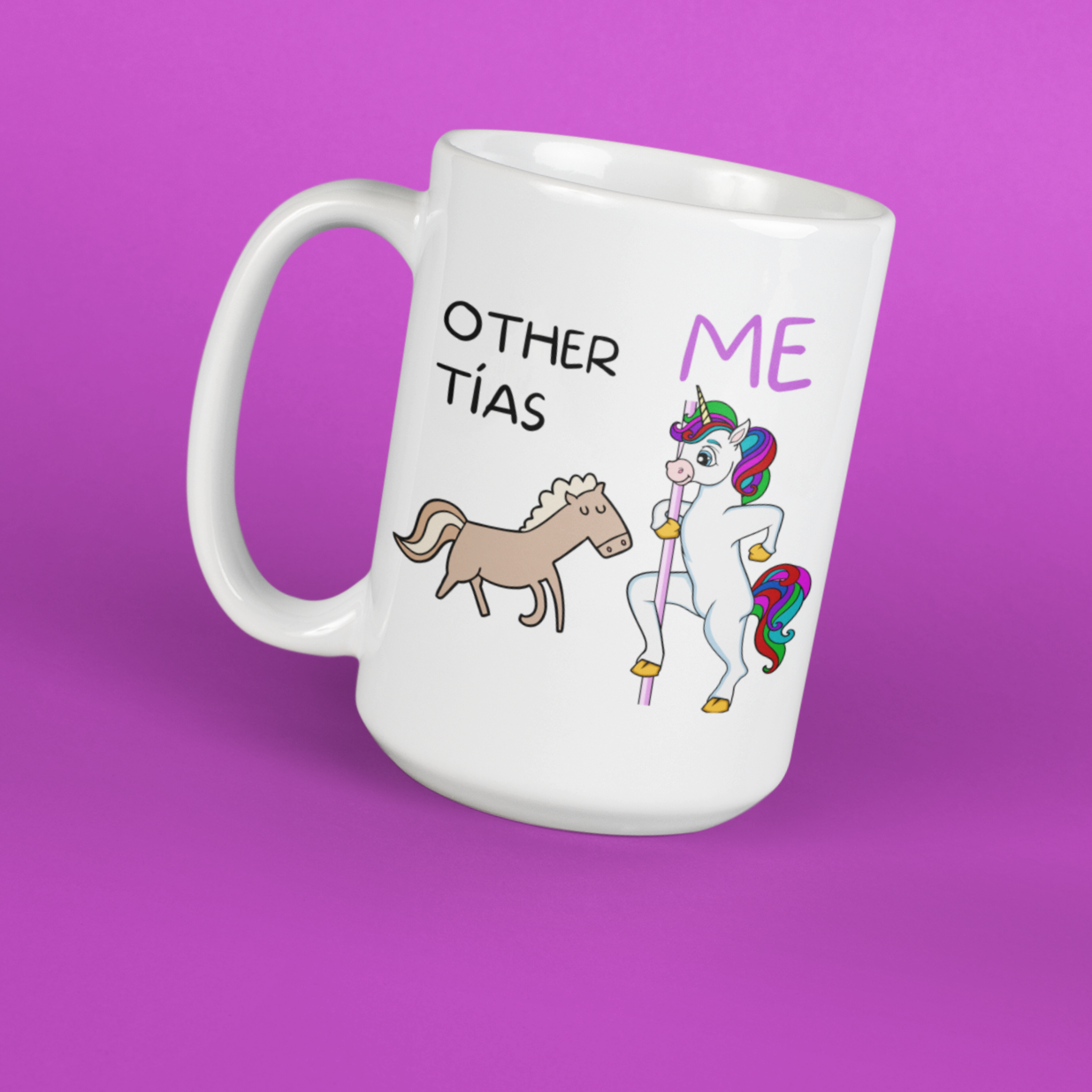 Angled shot of a Funny tall white mug for Latinos and Spanish speakers. The graphic shows a regular cartoon horse with the words "other tias" above it. The other image is a colorful cartoon unicorn on a stripper pole with the word "me" above it.