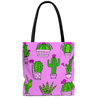 Latina-inspired large tote bag to celebrate Latino culture.  The background is pink and the graphic is cactus themed with a variety of cartoon cacti., with the phrase "know your roots"