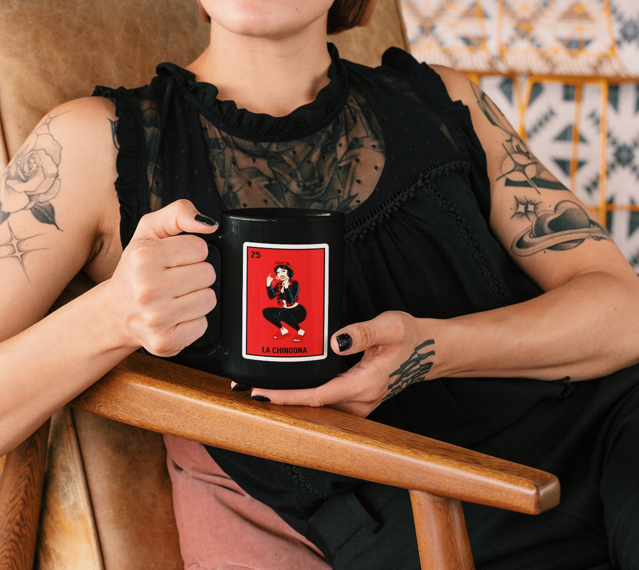 Empowering black mug featuring a Lotería-style illustration of a carefree Latina woman