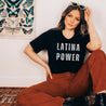hispanic woman wearing a An eye-catching shirt with a vintage design celebrating Latina power