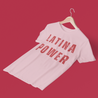 A pink Latina pride t-shirt that says "LATINA PRIDE" in red distressed letteting