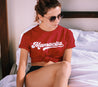 woman wearing Stylish 'Mamacita' red T-Shirt with vintage-inspired white cursive text