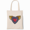 A mexican canvas tote bag featuring a colorful graffiti-style heart with golden wings symbolizing freedom