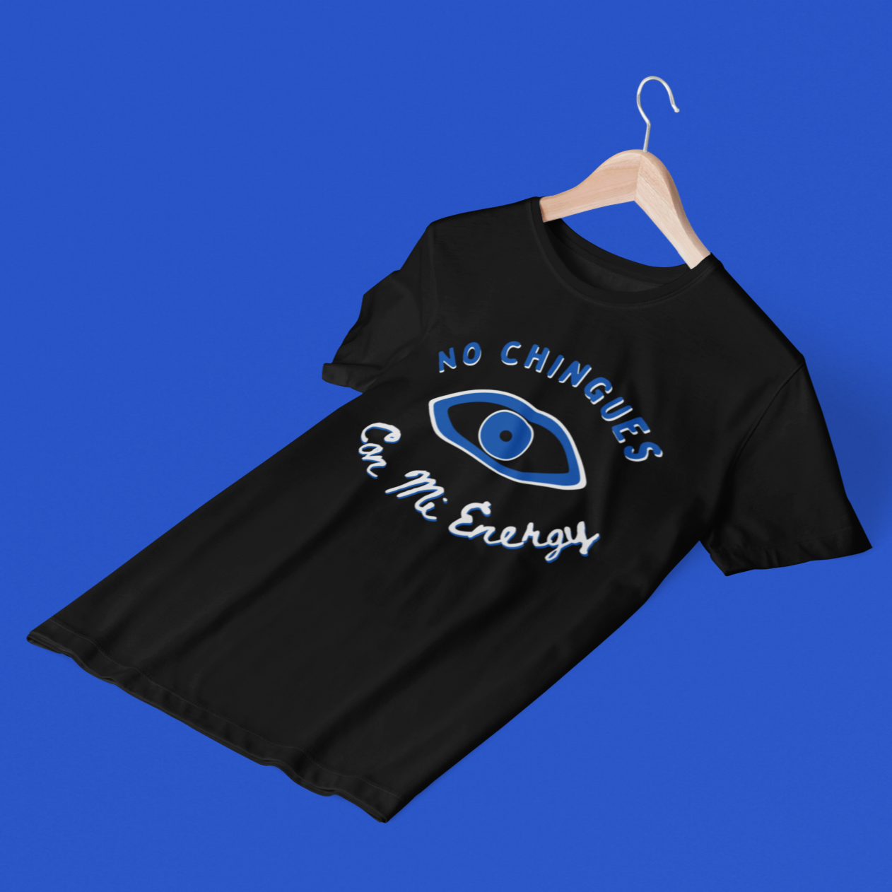 Black t-shirt for latinas with evil eye graphic and text 'no chingues con mi energy'