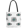 Latina-inspired large tote bag to celebrate Latino culture. The background is white and the graphic is evil eye themed in a repeating pattern with the phrase "no chingues con mi energy".  Tote bag for Spanish speakers