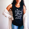 Women's black activism sleeveless shirt with bold cursive that says 'No Human is illegal on stolen land'