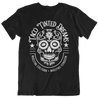 T-shirt with tattoo-style Mexican sugar skull logo and text "taco tinted dreams" and "nuestra cultura, nuestro corazon"