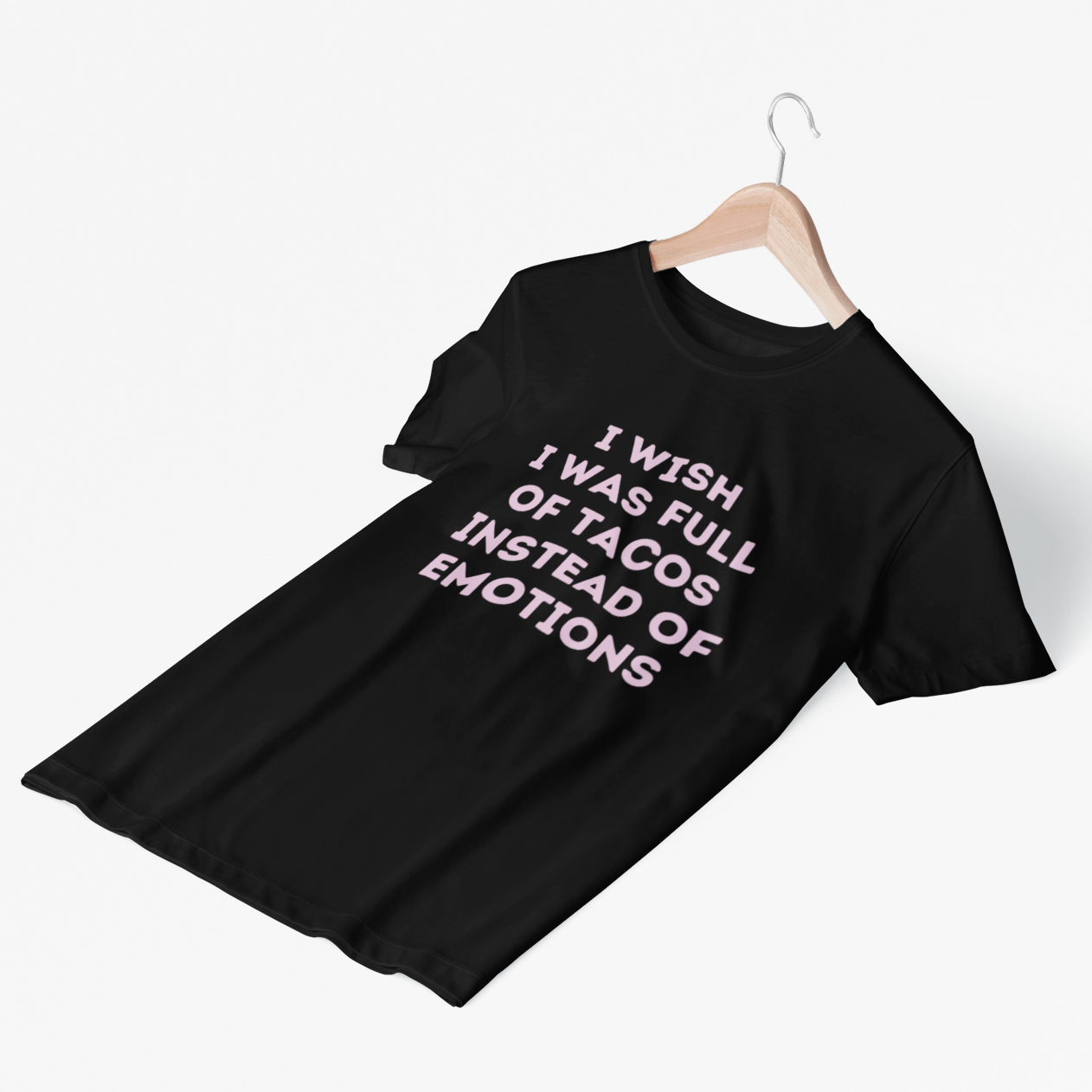 Funny black t-shirt for latina women and taco lovers that states "I wish I was full of tacos instead of emotions" in vintage pink lettering.