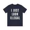 Bold t-shirt for Mexican and Hispanic men, with the text 'I Just Look Illegal' in a street style font on a blue fabric
