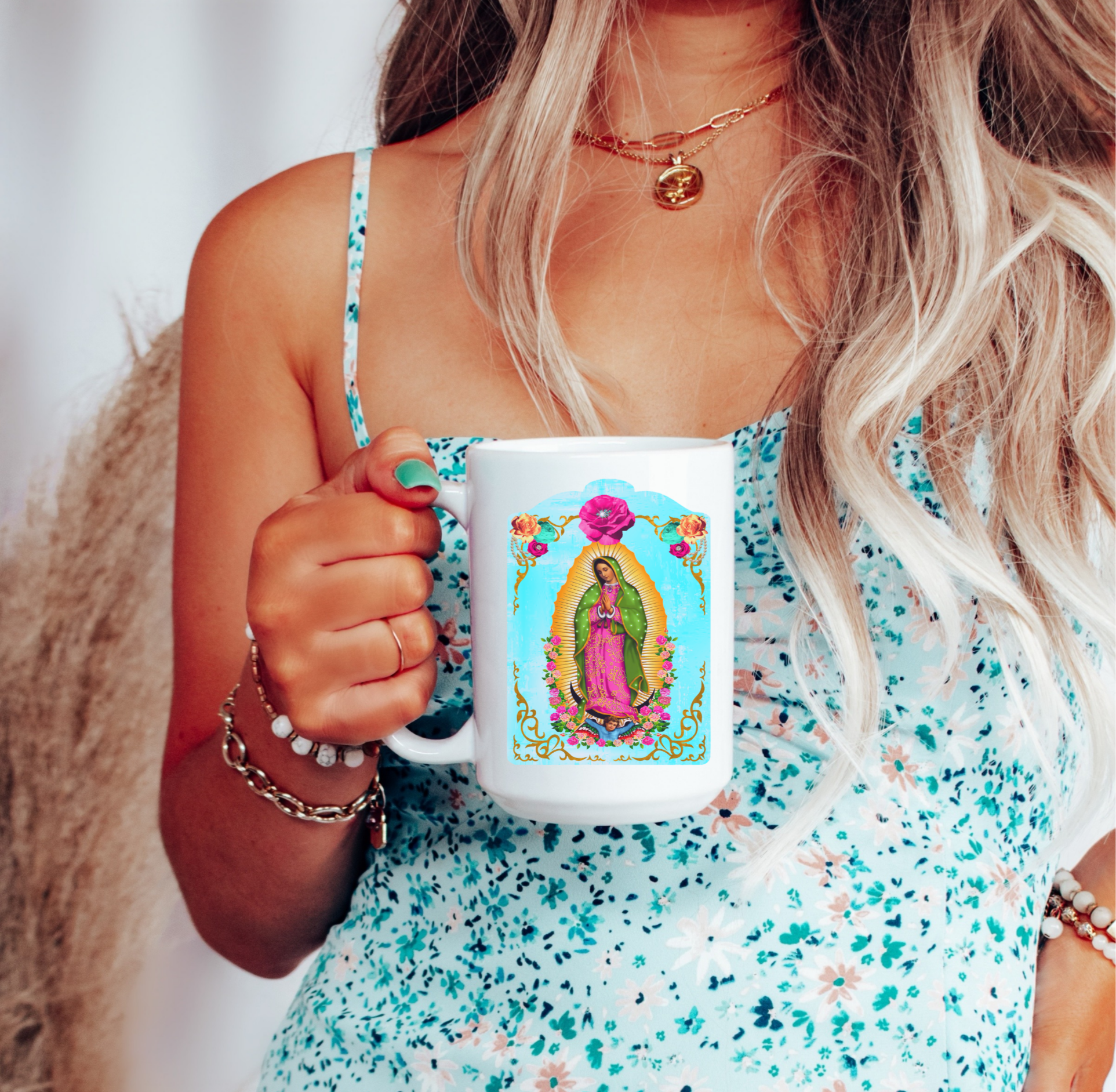 latina woman holding a mug with vibrant and classic depiction of 'La Virgen de Guadalupe' on white background